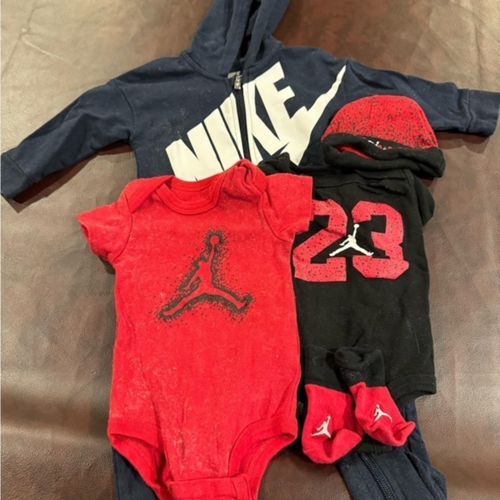 Brand new Jordan baby gift set plus 1 additional one piece from Nike